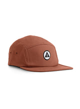 Sutsu Mountain Circle 5 Panel Cap - terracotta cap on white background - sustainable headwear with circle, triangle and tree badge.
