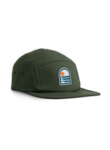 Sutsu Sun & Waves 5 Panel Cap - green baseball cap on white background - designer headwear with sun and sea logo.
