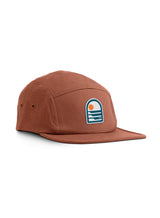 Sutsu Sun & Waves 5 Panel Cap - terracotta brown baseball cap on white background - sustainable headwear with sun and sea badge.