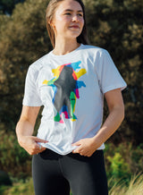 Woman wearing a Sutsu Dancing Bear T-Shirt - a white, organic cotton t-shirt with kaleidoscopic bear graphic design.