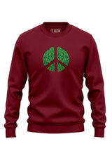 A burgundy Sutsu Peace Out Sweatshirt - organic cotton, graphic sweatshirts with peace symbol and green leaves design.