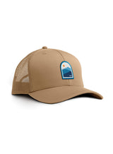 Sutsu Blue Mountain Trucker Cap in sand brown - ethically made baseball caps with mountains and sun badge.