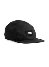 OG Badge 5 Panel Black Cap - a sustainable cap by Sutsu with an abstract logo.