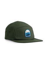 Sutsu Blue Mountain 5 Panel Cap - green cap on white background - sustainable headwear with sun and mountain range badge.