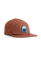 Sutsu Blue Mountain 5 Panel Cap - terracotta brown cap on white background - sustainable headwear with sun and mountain range graphic.