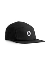 Sutsu Mountain Circle 5 Panel Cap - black cap on white background - ethical headwear with circle, triangle and tree badge.