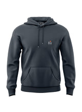 Studio photo of a Two Trees EMB Hoodie - a slate grey pullover hoodie from Sutsu with trees and sun embroidered logo.
