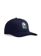 Sutsu Sun & Waves Ranger Cap - a navy blue branded cap featuring sun and sea graphic.