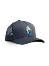 Petrol grey Sutsu Sun & Waves Trucker Cap - a sustainable cap featuring an abstract sun and waves graphic badge.
